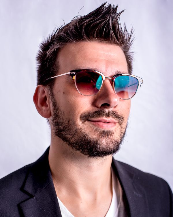 DJ Stephen Craig, blazer and shades